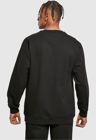 Merchcode Sweatshirt 'University Of Cambridge - Est 1209' in Zwart