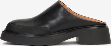 Kazar Studio Mules in Black: front