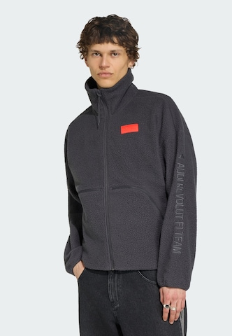 ADIDAS PERFORMANCE - Chaqueta polar funcional en negro: frente