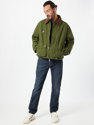 LEVI'S ® Övergångsjacka 'The Fishing Jacket' i grön