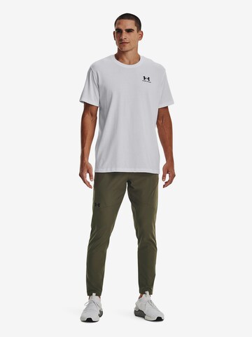 UNDER ARMOUR Tapered Sportbyxa 'Unstoppable' i grön