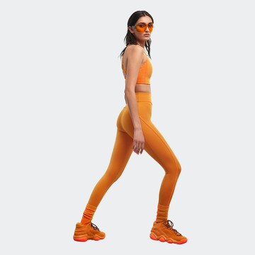 ADIDAS PERFORMANCE Skinny Sporthose 'Adidas x Ivy Park' in Orange