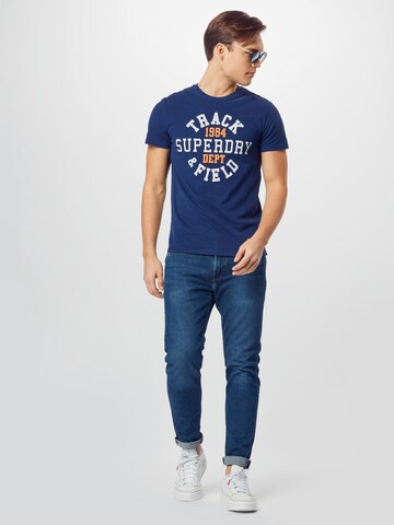 Superdry Zwężany krój Koszulka w kolorze niebieski