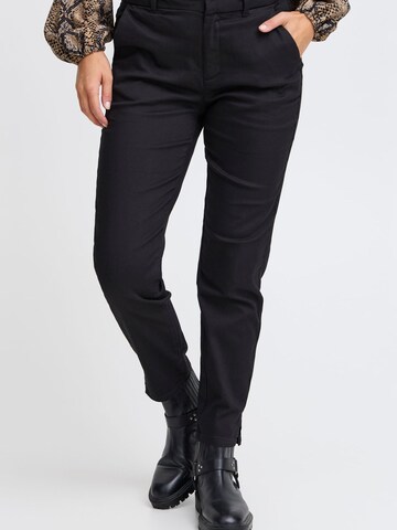 Skinny Pantaloni chino di PULZ Jeans in nero