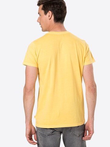 T-Shirt Revolution en jaune