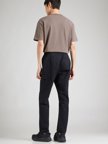 juoda COLUMBIA Standartinis Laisvalaikio kelnės 'Rapid Rivers': galas