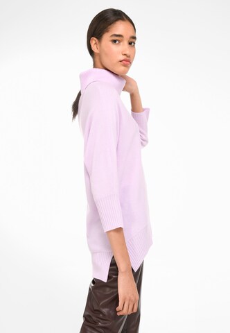 Pull-over include en violet