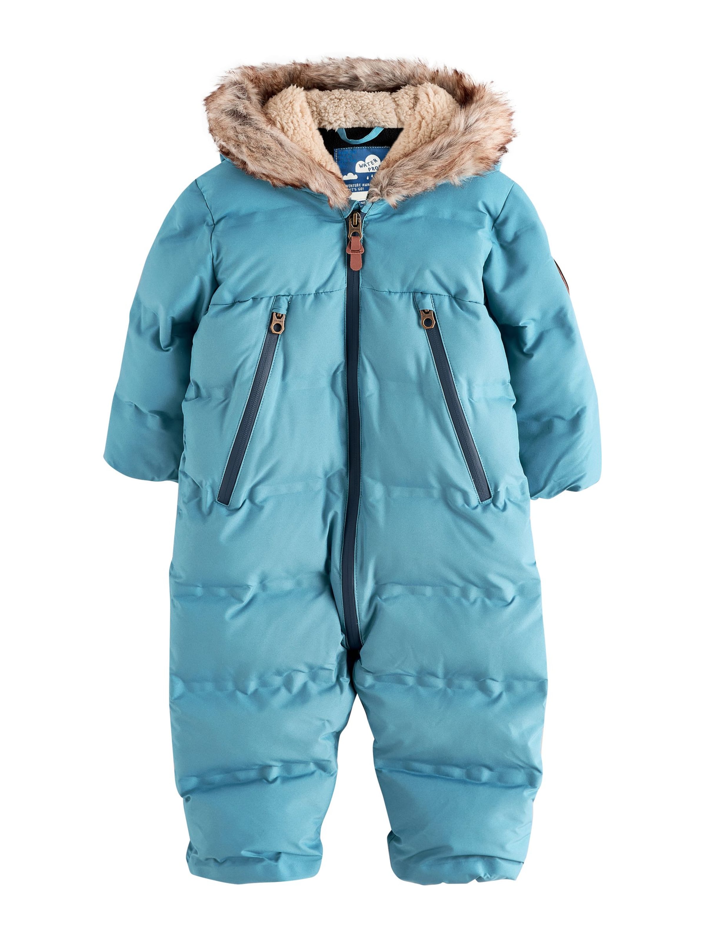 Next Overall i blå: forside