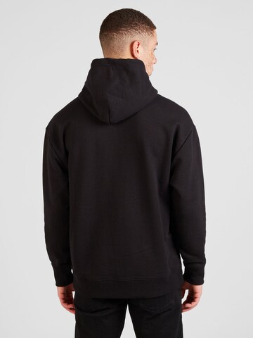 Tommy Jeans - Sudadera en negro