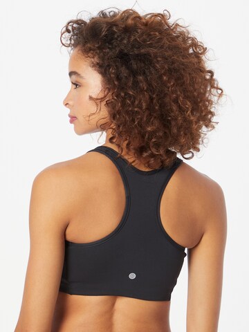 Athlecia Bustier Sportmelltartók 'Inere' - fekete