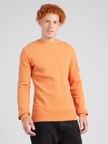 Calvin Klein Jeans Тениска в оранжево: отпред
