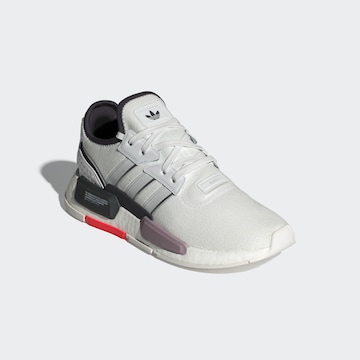 ADIDAS ORIGINALS Matalavartiset tennarit 'NMD_G1' värissä valkoinen