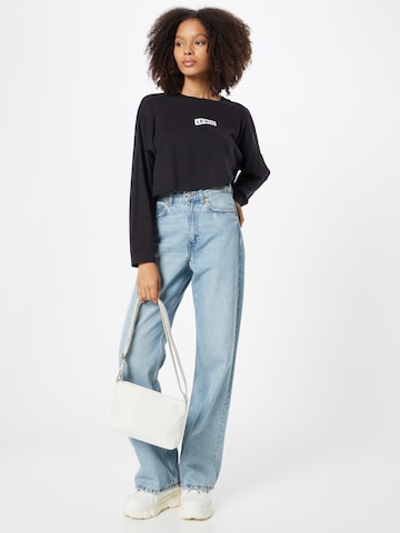 LEVI'S ® Μπλουζάκι 'Graphic LS Crop Reese' σε μαύρο