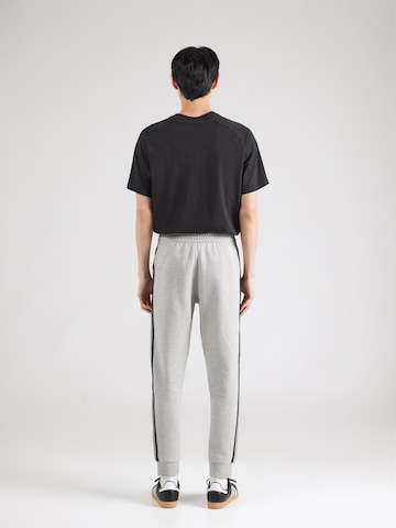 ADIDAS ORIGINALS Tapered Trousers in Grey