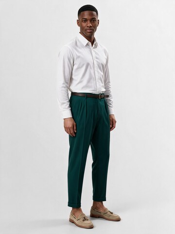 Antioch - Tapered Pantalón plisado en verde