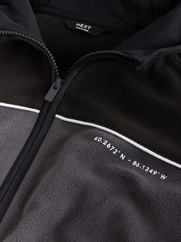 Next - Chaqueta polar en negro