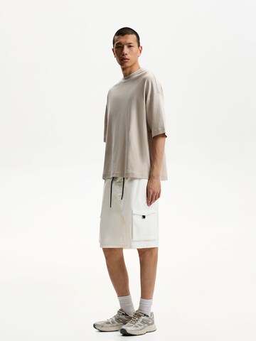 Bershka Loosefit Cargobukser i hvid