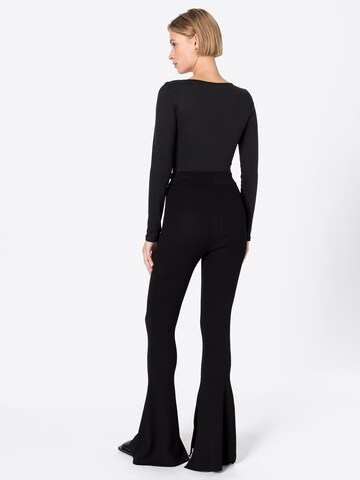 évasé Pantalon 'Calajero' Essentiel Antwerp en noir