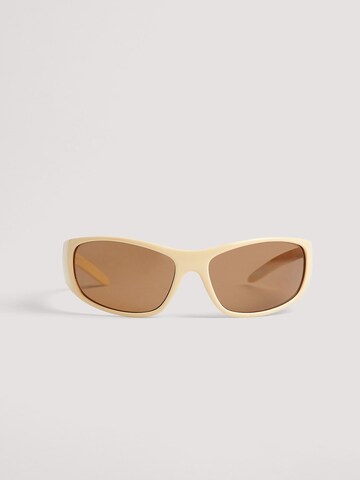 Lunettes de soleil NA-KD en jaune