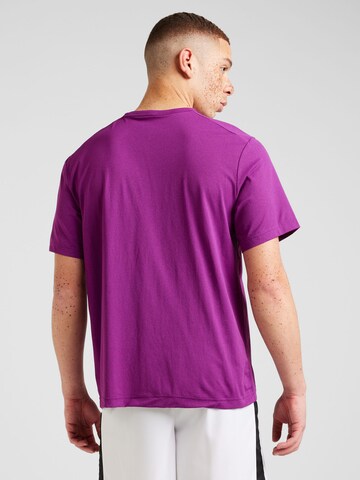 NIKE Performance shirt 'Track Club' in Purple
