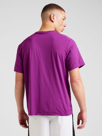 NIKE Sportshirt 'Track Club' in Lila