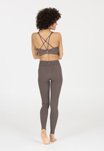 Athlecia Skinny Sportbroek 'Luxe' in Bruin