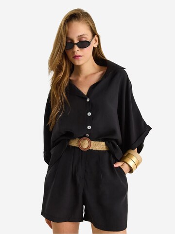 Pantalons de tailleur Bianco Lucci en noir