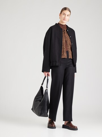 Wide leg Pantaloni con piega frontale di & Other Stories in nero
