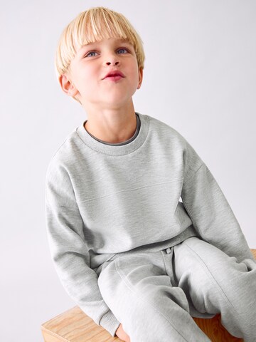 MANGO KIDS Дънки Tapered Leg Панталон в сиво