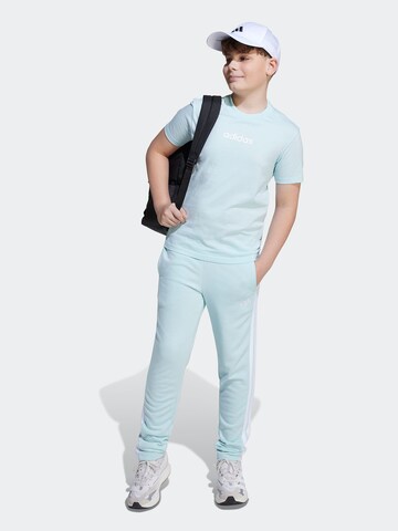 ADIDAS SPORTSWEAR - Camisa funcionais em azul: frente