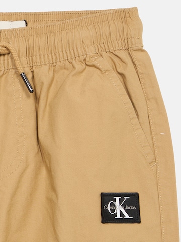 Tapered Pantaloni de la Calvin Klein Jeans pe maro