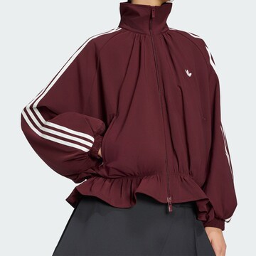 ADIDAS ORIGINALS - Chaqueta de entretiempo en rojo