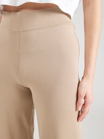 ABOUT YOU Loosefit Housut 'Kasha' värissä beige
