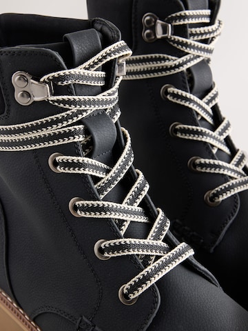 Bottes à lacets Next en noir