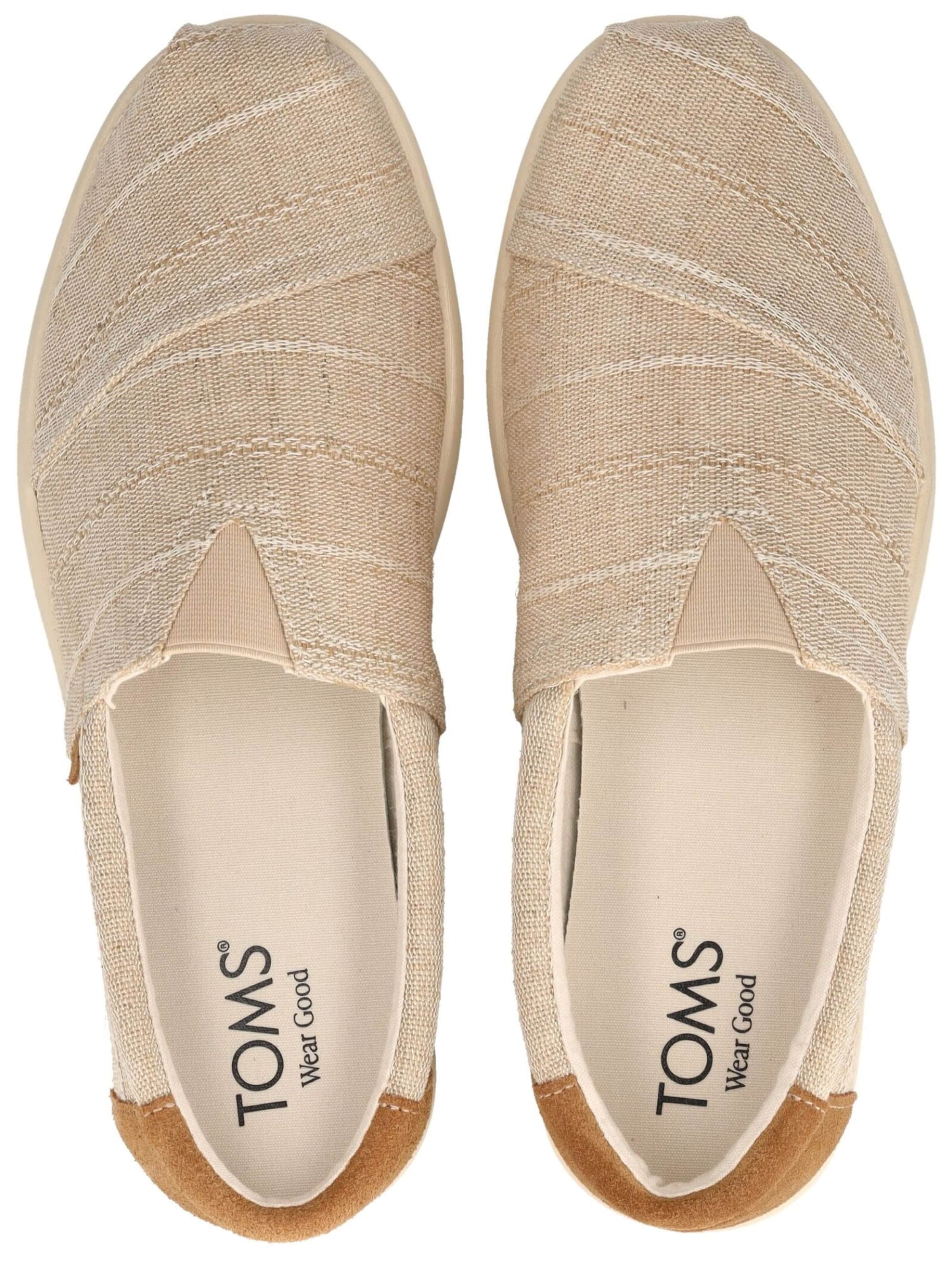 Slipper di TOMS in beige