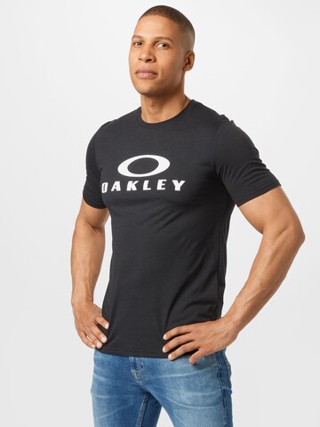 OAKLEY - Camisa funcionais 'Bark' em preto: frente