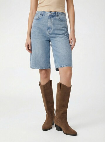 Baggy Jeans de la KAVAZI pe albastru: față