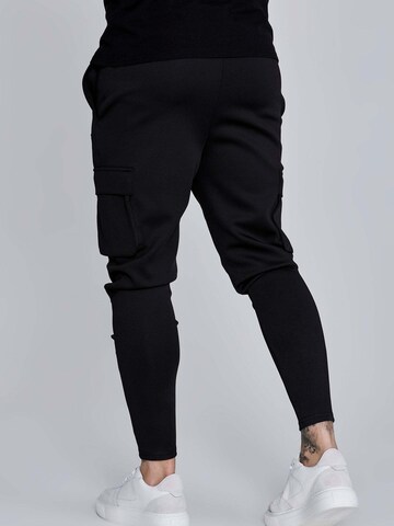 SikSilk Slimfit Sportbroek 'Essentials Poly' in Zwart