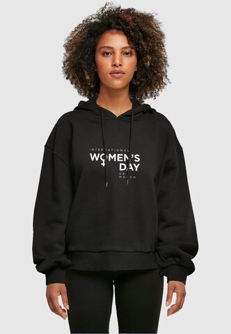 Merchcode Sweatshirt 'WD - International Women's Day 2' in Zwart: voorkant
