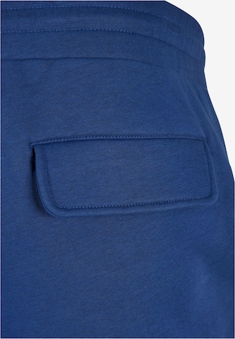 Effilé Pantalon cargo Urban Classics en bleu