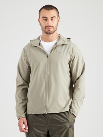 NIKE - Chaqueta de chándal 'FORM' en verde: frente