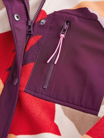 Giacca di pile di Next in rosso