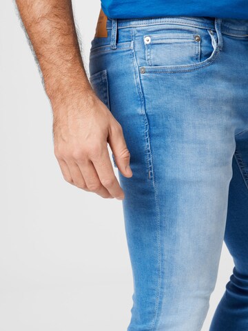 Skinny Jeans 'Tom' de la JACK & JONES pe albastru