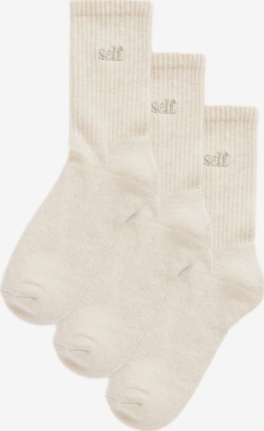 self. Socks in Beige: front