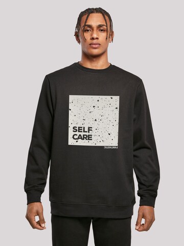 F4NT4STIC Sweatshirt 'SELF CARE' in Zwart: voorkant