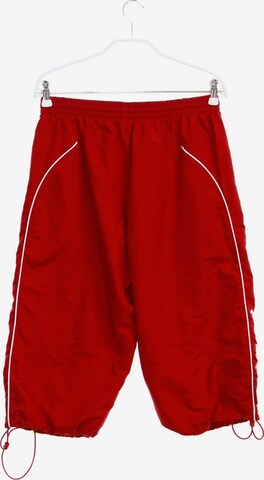 UMBRO Shorts in 34 in Red