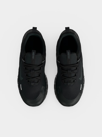 Chaussure de sport 'Free Ride' NIKE en noir