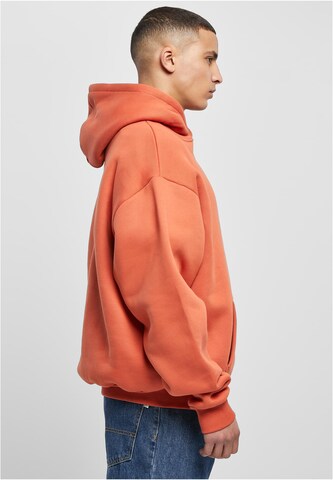 Sweat-shirt Karl Kani en orange