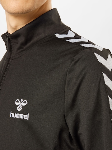 Veste de survêtement 'Nathan 2.0' Hummel en noir