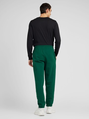 Reebok Regular Trousers in Green